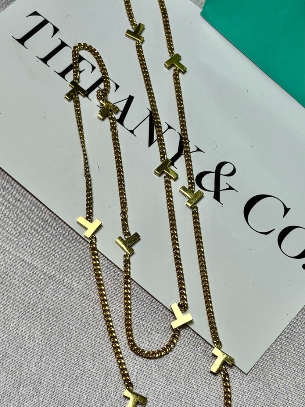 Tiffany & Co. 18k yellow gold  initial T long curb link necklace.